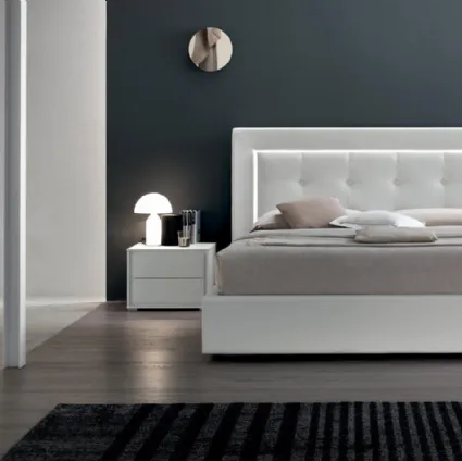 Double bed with classic headboard in capitonné processing with integrated Deo Light by Maronese Acf.